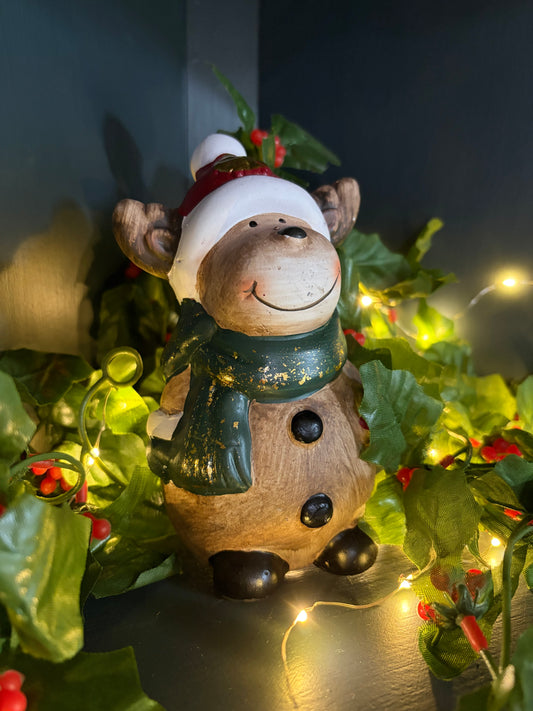 Pottery reindeer with Santa Hat