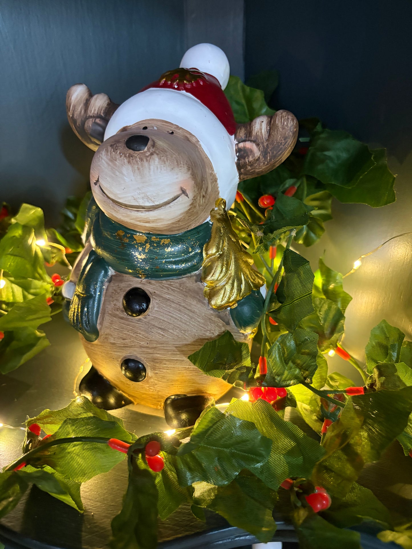 Pottery reindeer with Santa Hat